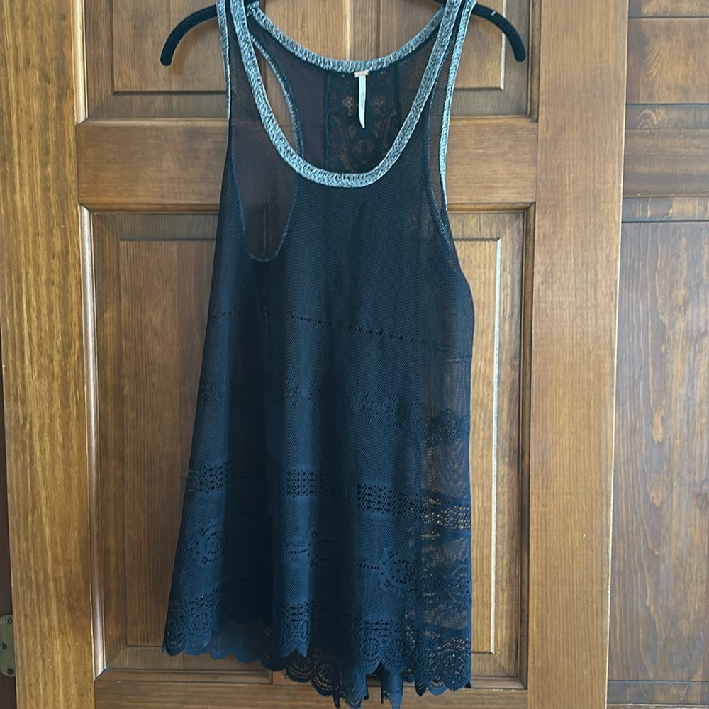 Long tank top.  Black lace with gray trim.